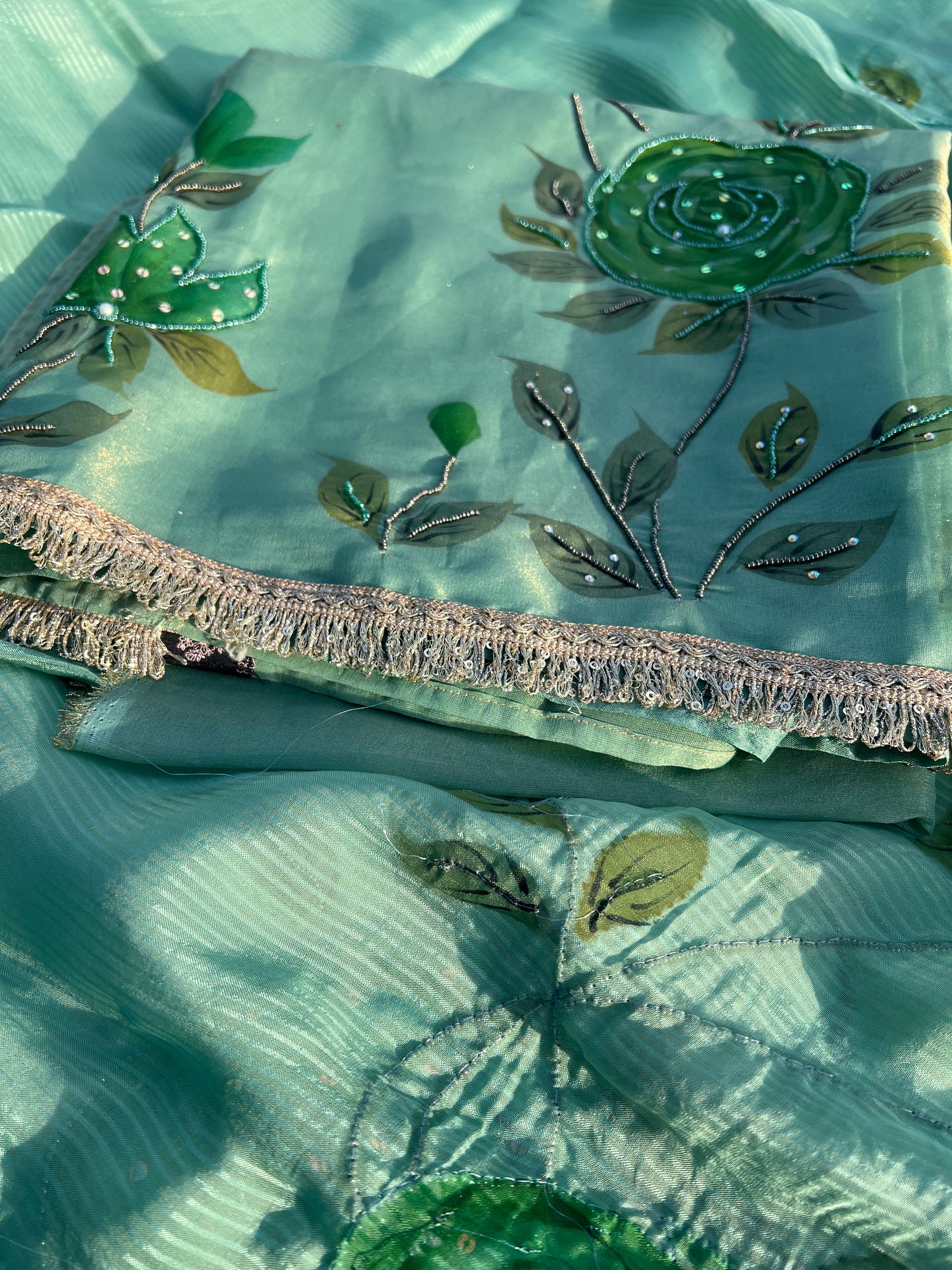 Artisan-crafted tissue silk suit featuring delicate hand painting and lightweight luxury