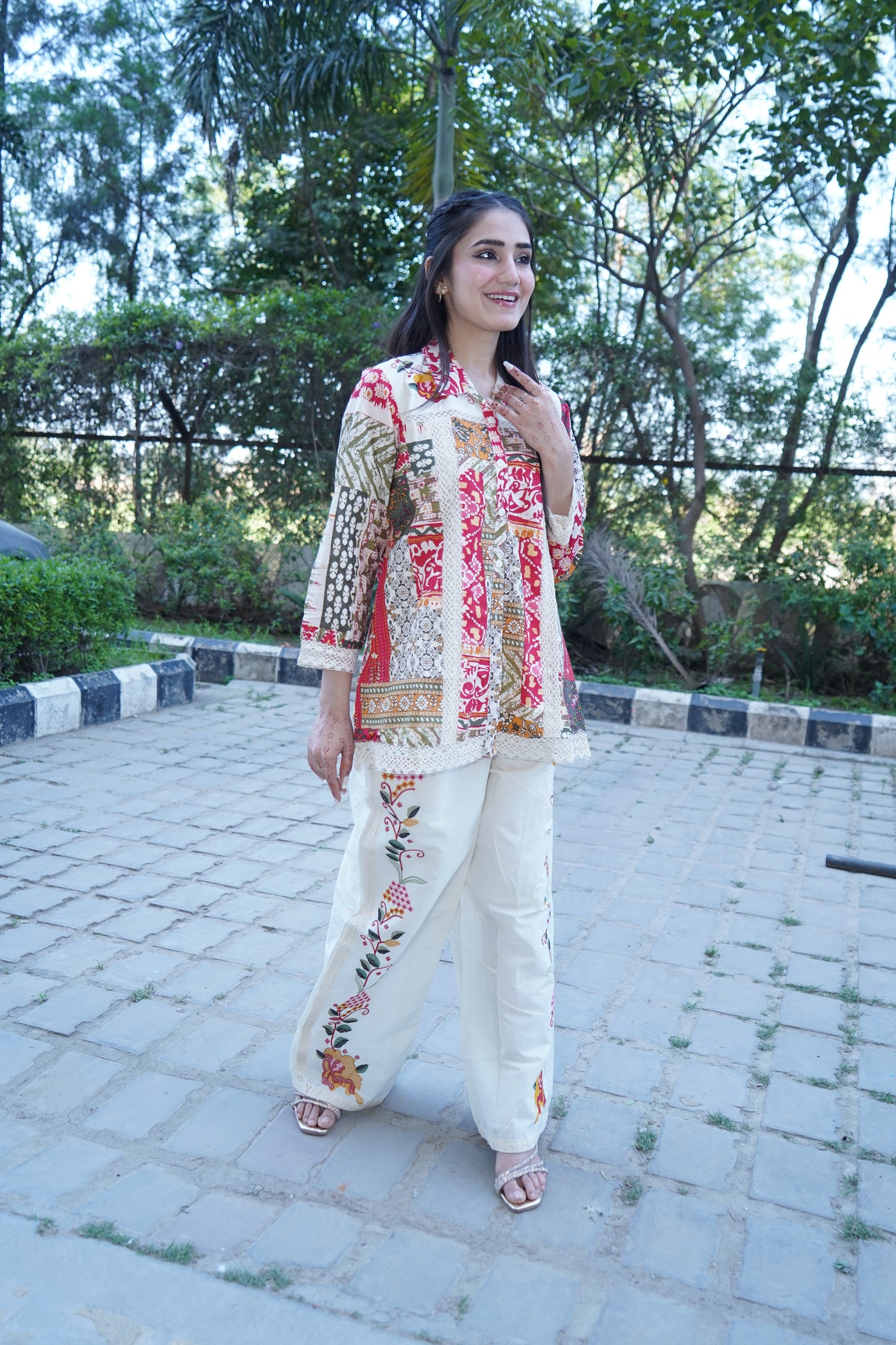 Chic pure cotton kurta with printed trouser and ethnic design.