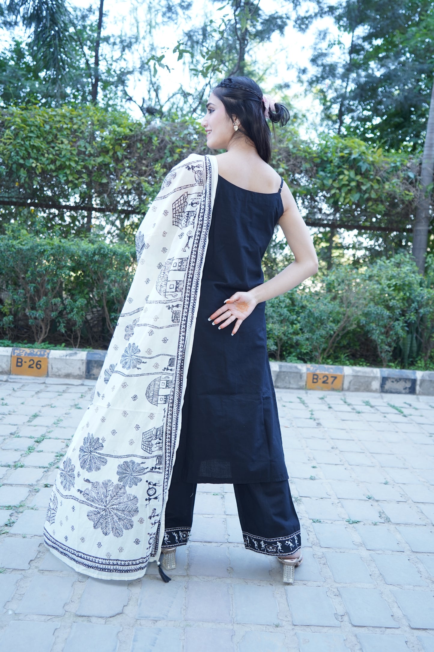 Classic Shehnaaz black embroidered straight suit for ethnic style.
