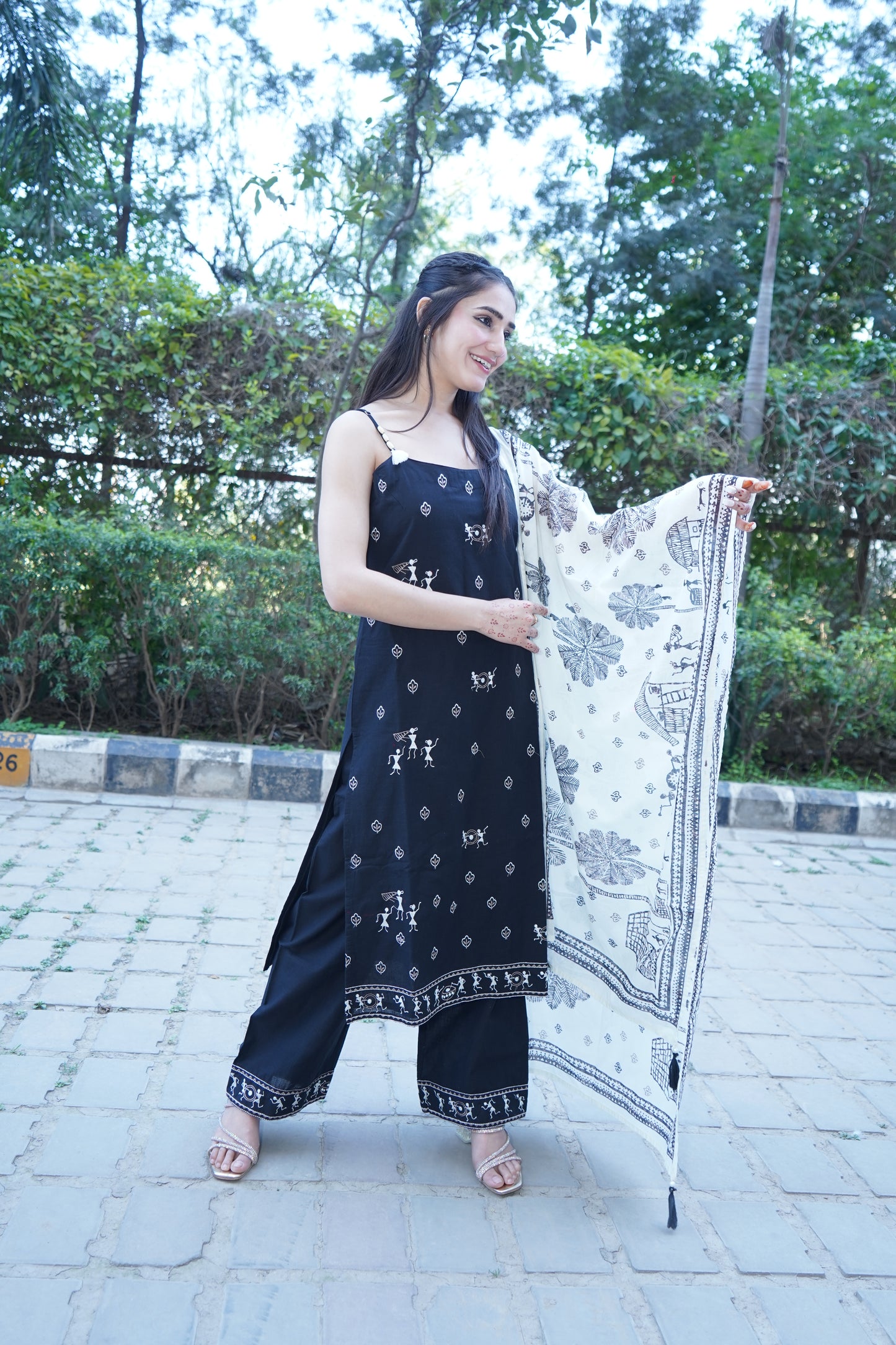 Designer Shehnaaz black straight suit with detailed embroidery.