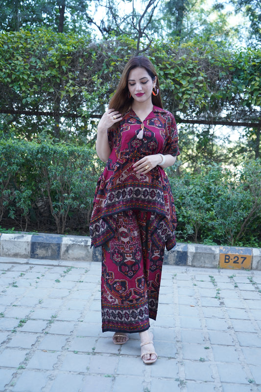Designer tunic with ethnic motifs paired with palazzo trousers
