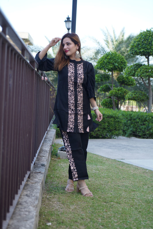 Designer ethnic suit with matching dupatta.