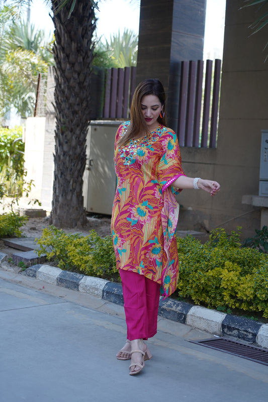 Designer kaftan style featuring intricate mirror work