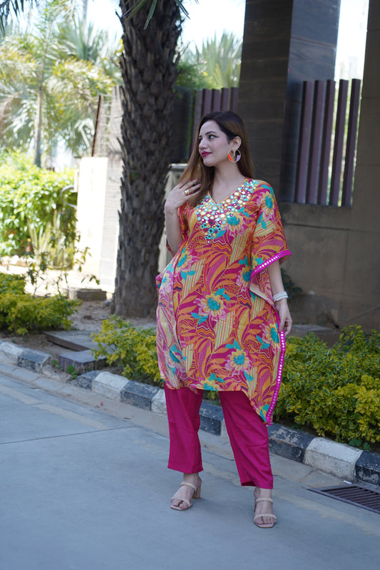 Elegant kaftan set with detailed mirror work embellishments