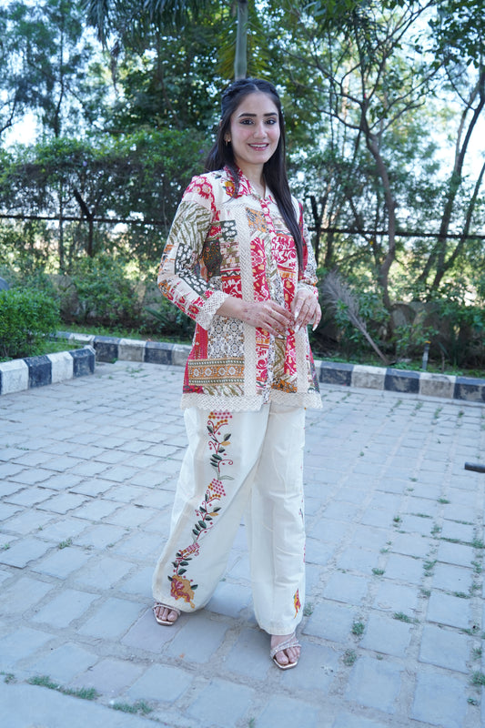 Elegant cotton kurta with multi ethnic motifs and trouser.