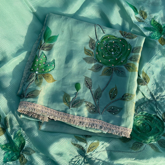 Elegant hand-painted tissue silk suit with artistic floral detailing and graceful drape