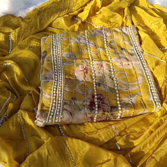 Close-up of elegant Viscos Organza suit highlighting intricate threadwork and sheer texture