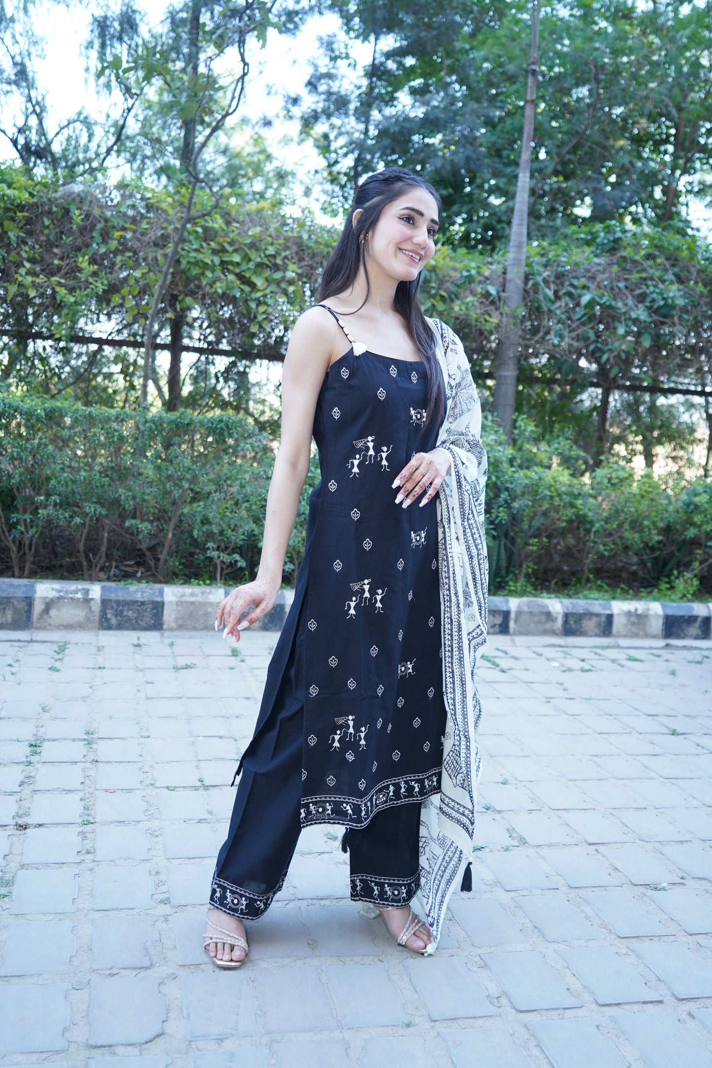 Festive black embroidered Shehnaaz straight suit for parties.