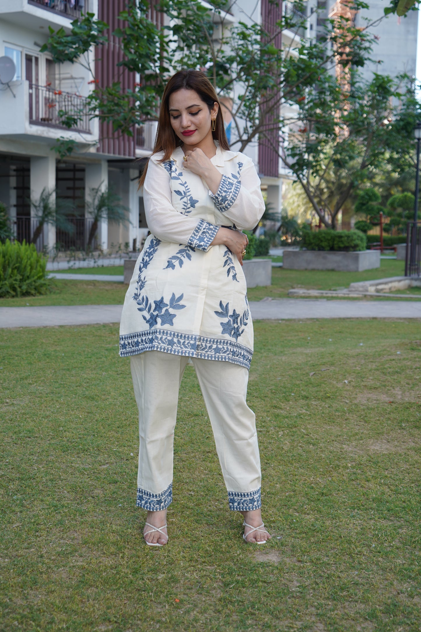 Festive white and grey cord set with detailed aari work