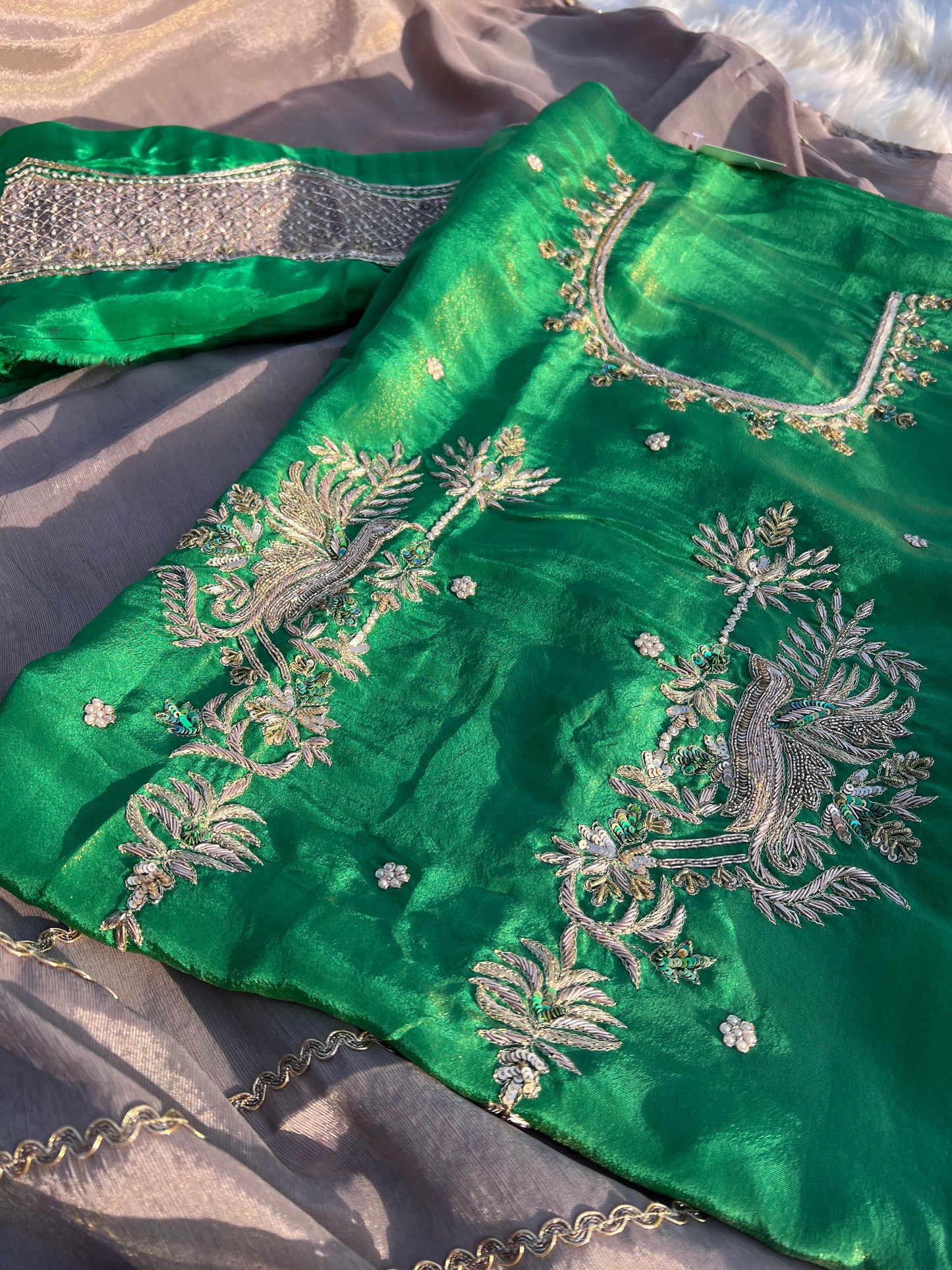 Glamorous organza suit with shimmering handwork for standout traditional style