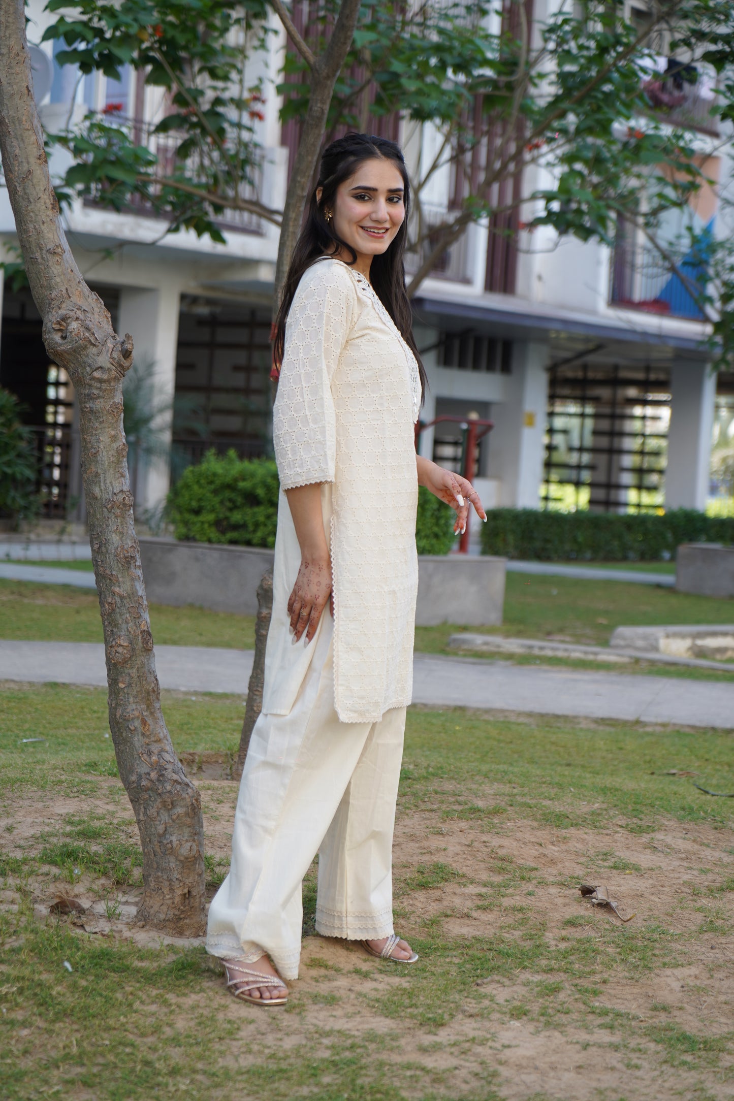 Graceful Noor off-white kurta set with silver stripe details