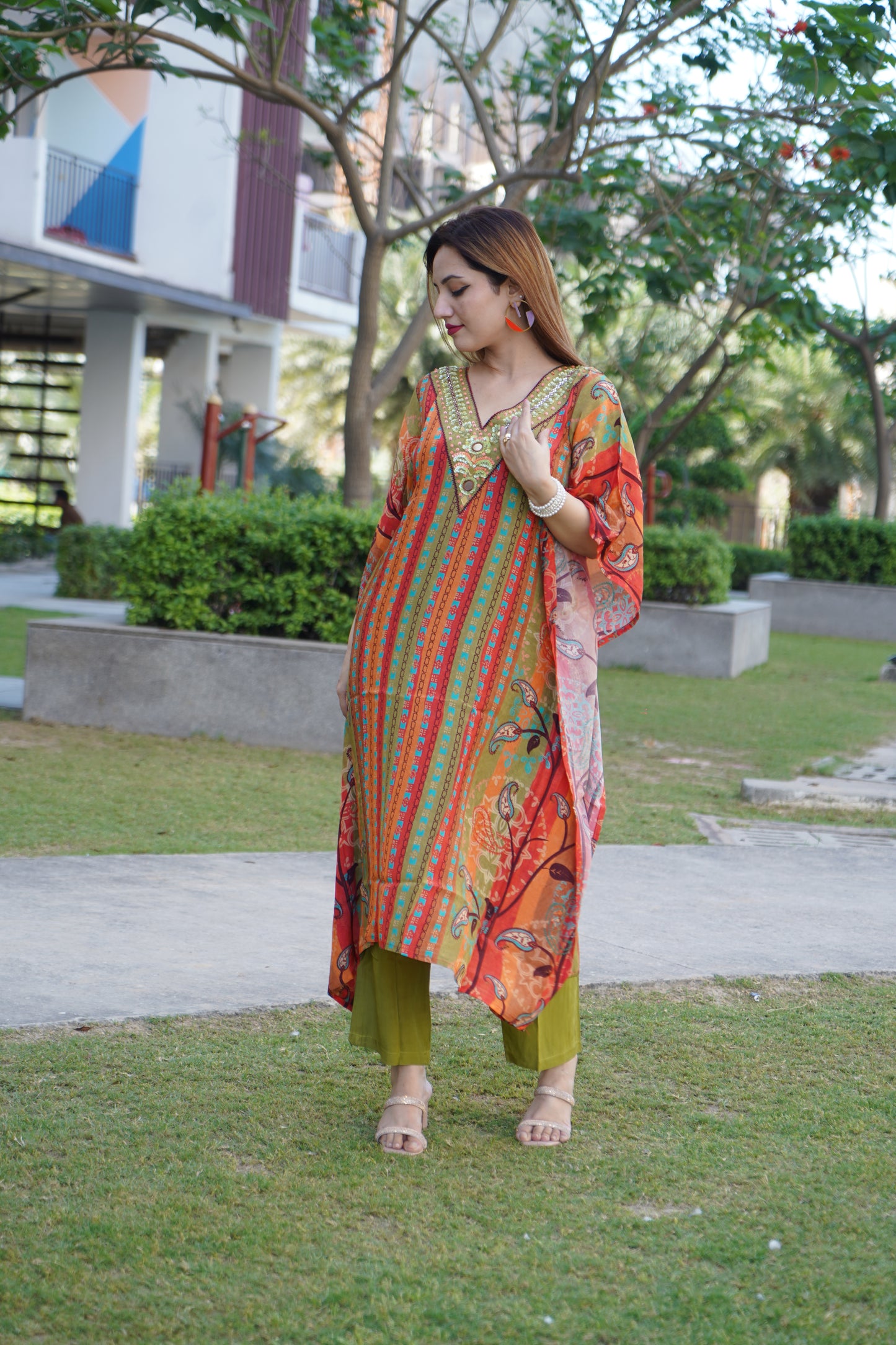 Luxe striped kaftan with elegant and relaxed design