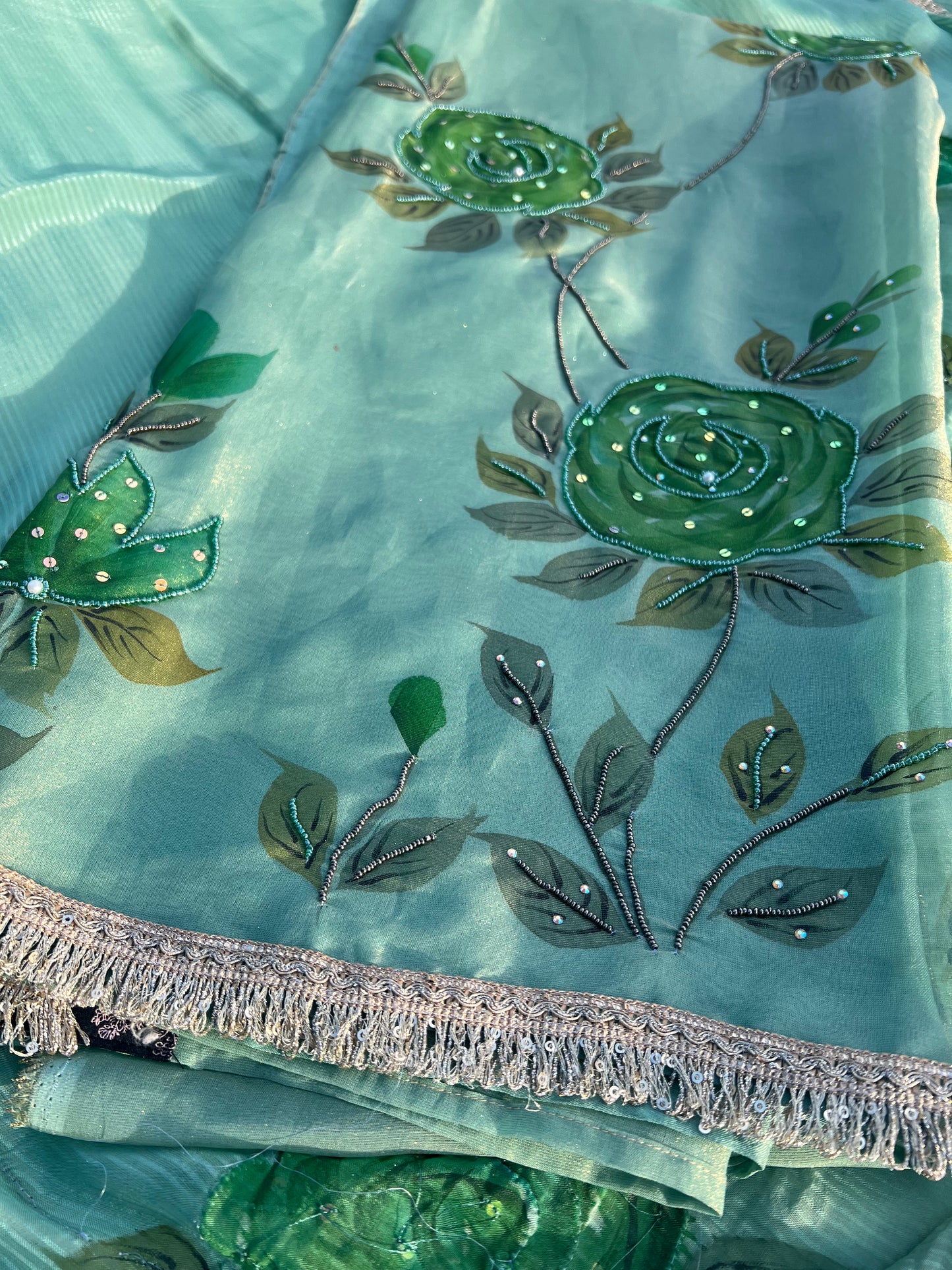 Luxe hand-painted tissue silk suit offering a breezy texture and exclusive designer appeal