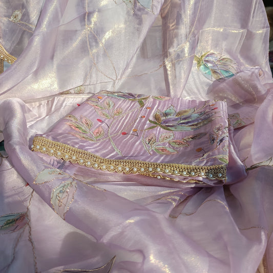 Elegant Mulmul Chanderi suit with handpainted floral designs for a graceful look.