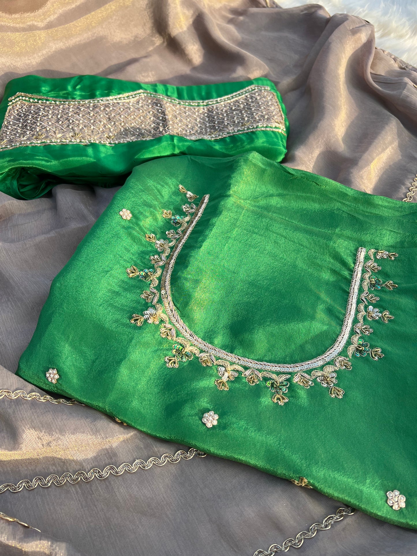 Shimmery organza suit featuring intricate handwork and refined craftsmanship