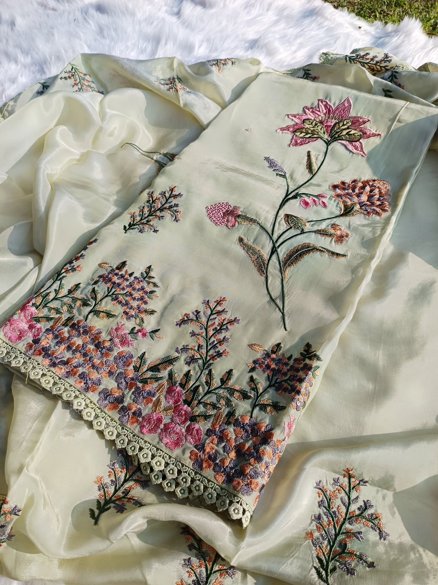 Embroidered organza silk suit with subtle sequin work and soft shine, ideal for elegant occasions