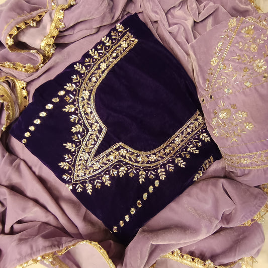 Luxurious velvet silk suit with a soft finish and refined embroidery.