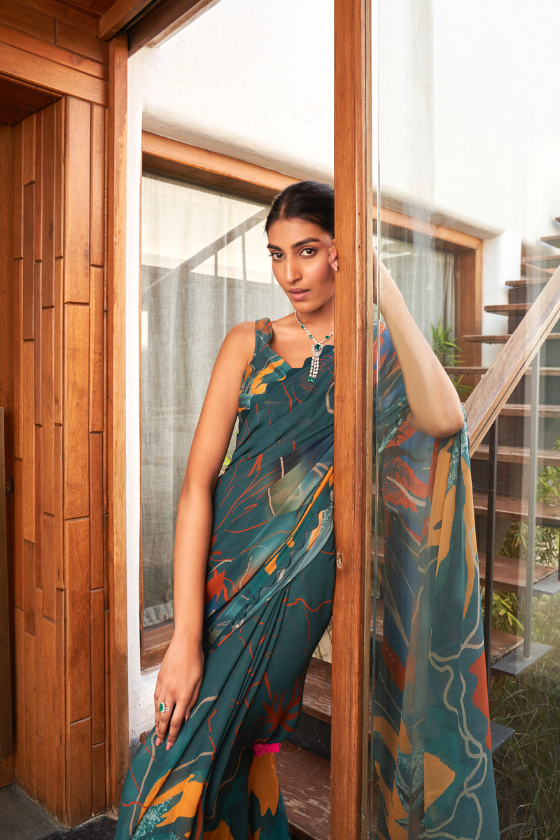 Elegant printed Designer Moss Saree in teal blue and multicolor patterns