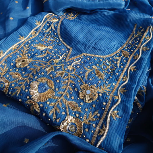 Pure Organza Handwork Suit displayed showcasing intricate embroidery.