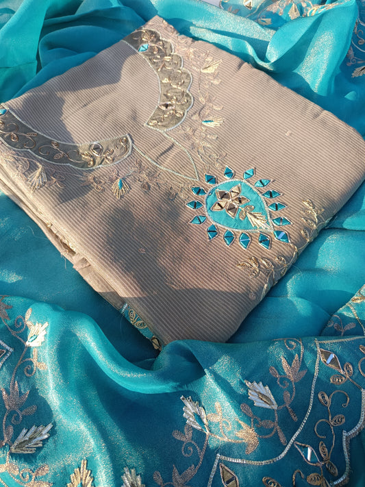 Pure Organza Silk Suit styled for an ethnic occasion, emphasizing its luxurious appeal and flowy silhouette.