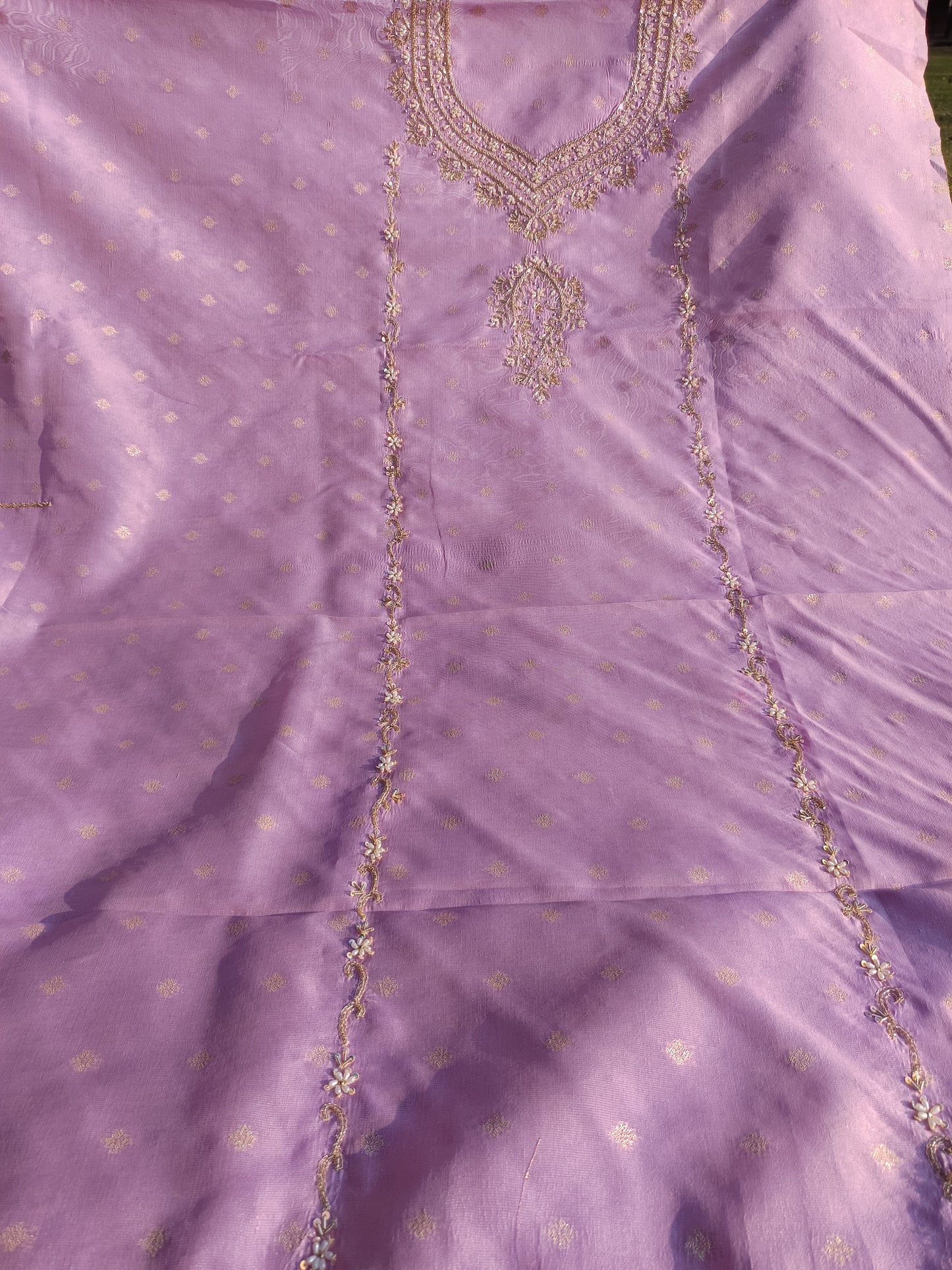 Styling inspiration featuring pure tissue silk handwork suit for festive occasions.