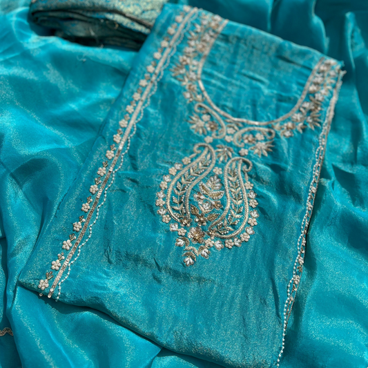 Radiant rose-toned organza suit with hand-embellished detailing and shimmer accents