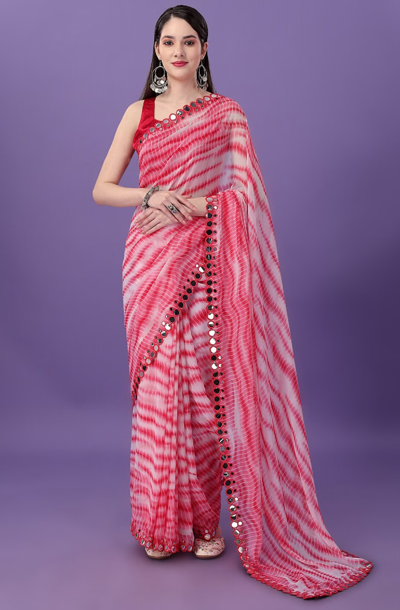 Stylish pink saree with Shibori print and mirror work detailing, perfect for festive occasions.