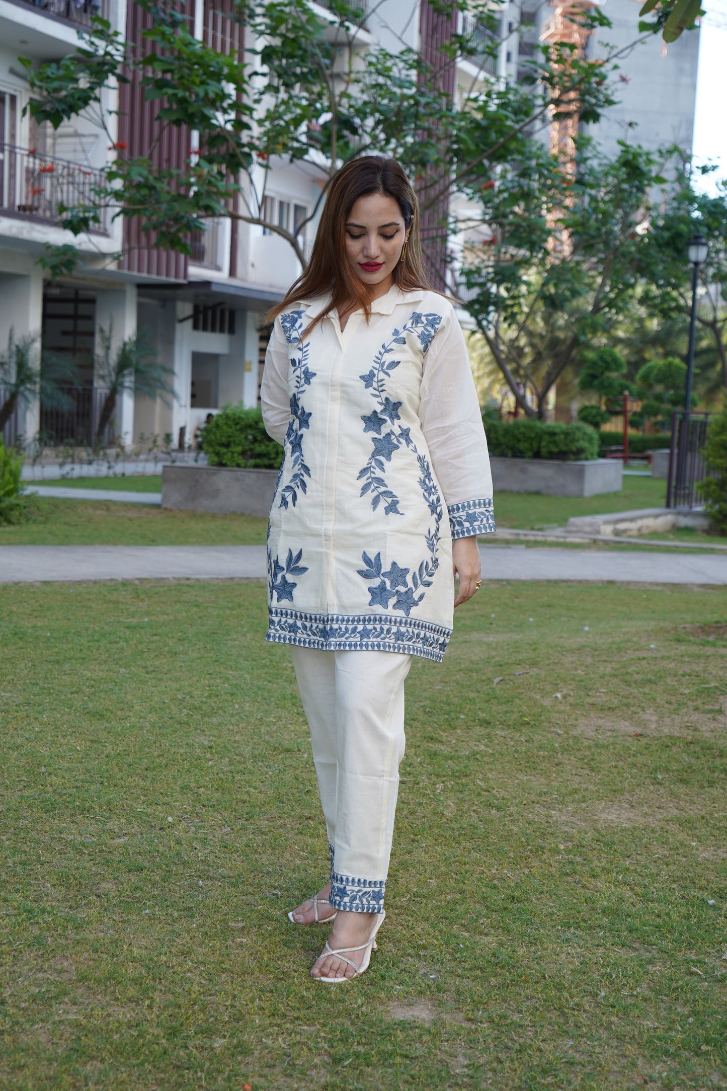 Stylish white with grey cord set featuring detailed aari work
