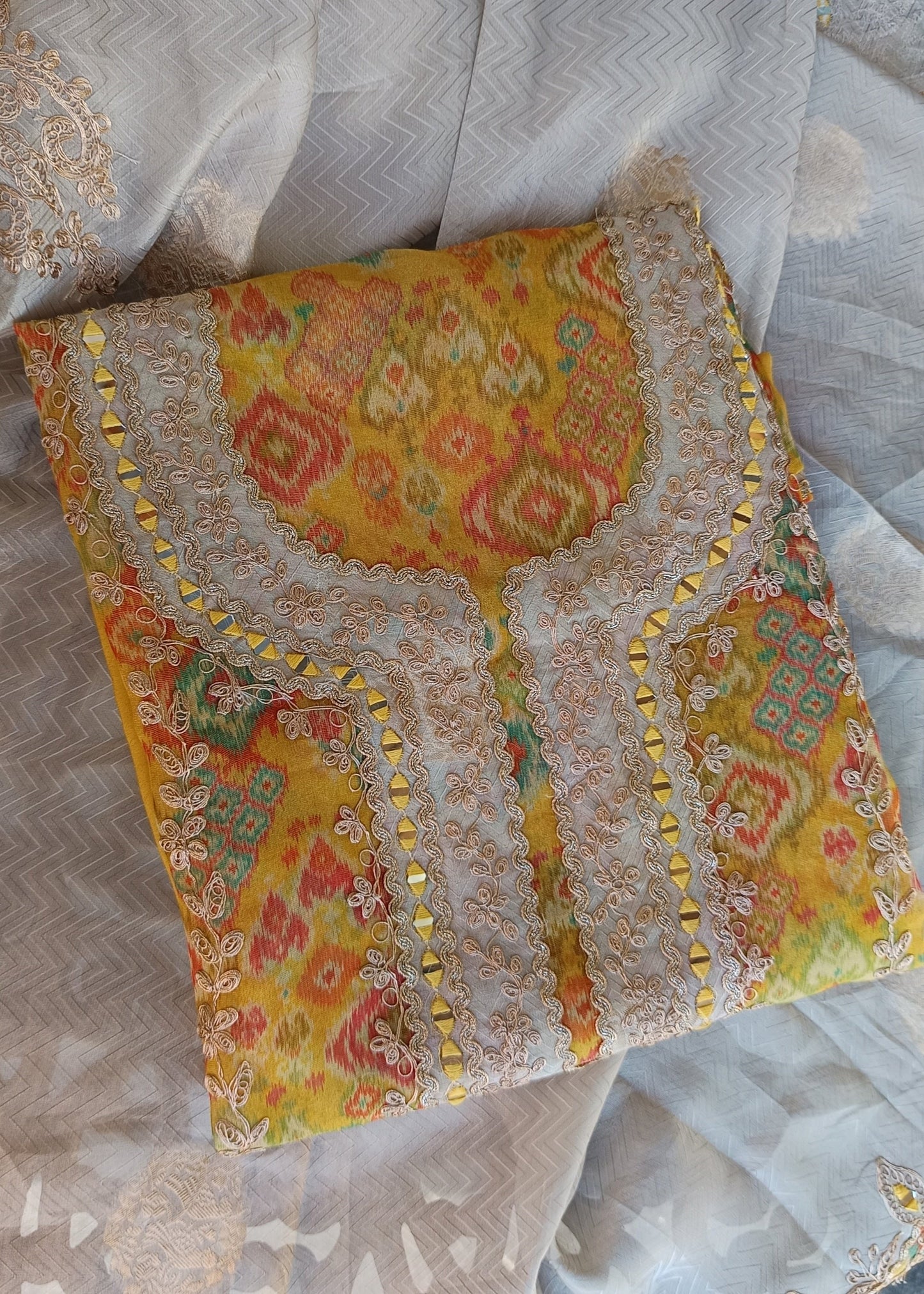 Elegant Printed Organza Unstitched Salwar Suit, perfect for festive and traditional wear.