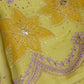 Unstitched organza dress material showcasing artisanal hand embroidery and subtle sheen