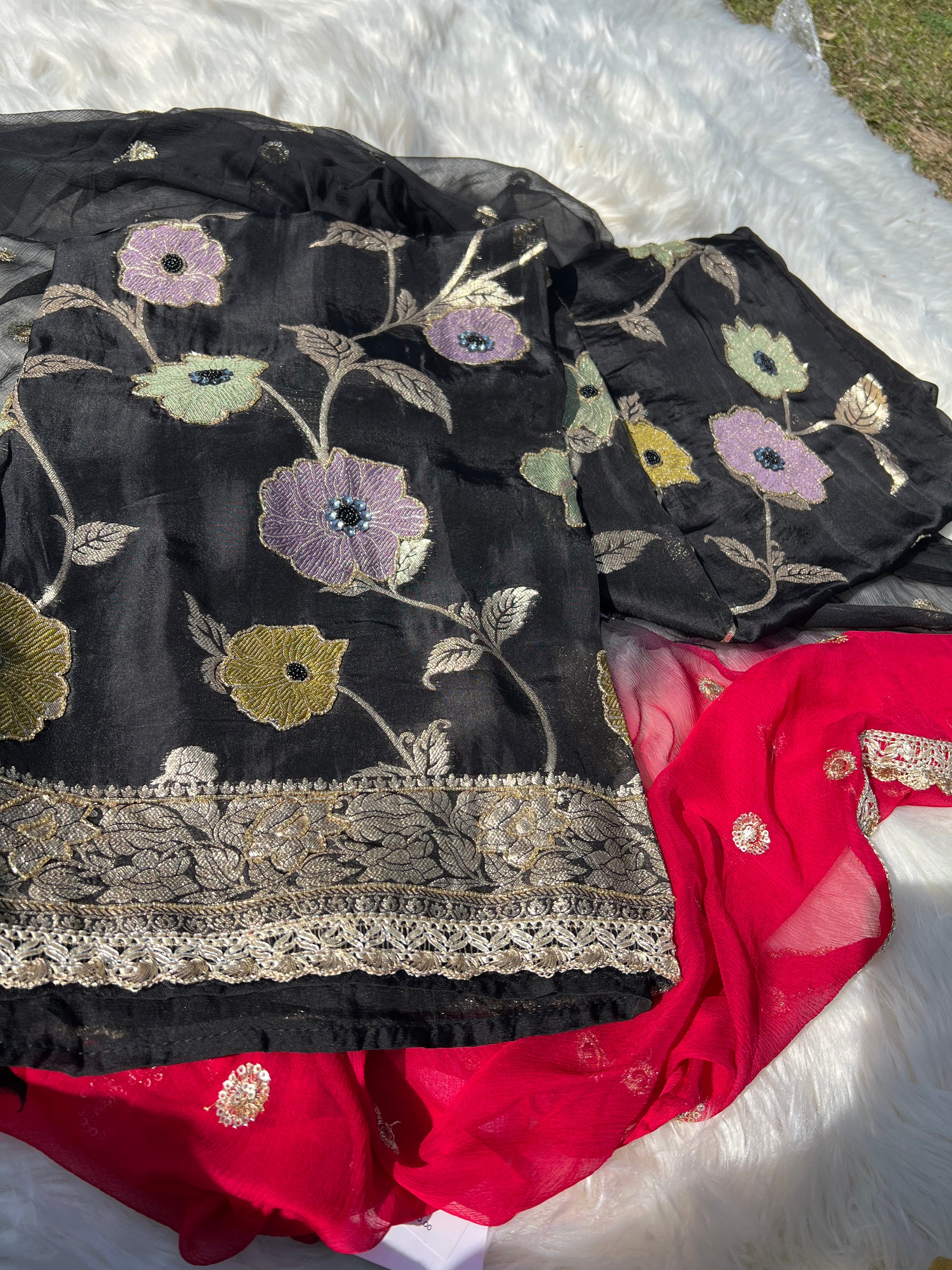 Rear view of the Banarasi black suit showing traditional craftsmanship and silhouette.
