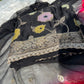 Black Banarasi georgette suit paired with an elegantly woven dupatta.
