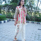 Chic pure cotton kurta with printed trouser and ethnic design.