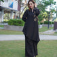 Chic V-neck tunic with intricate handwork and trousers.