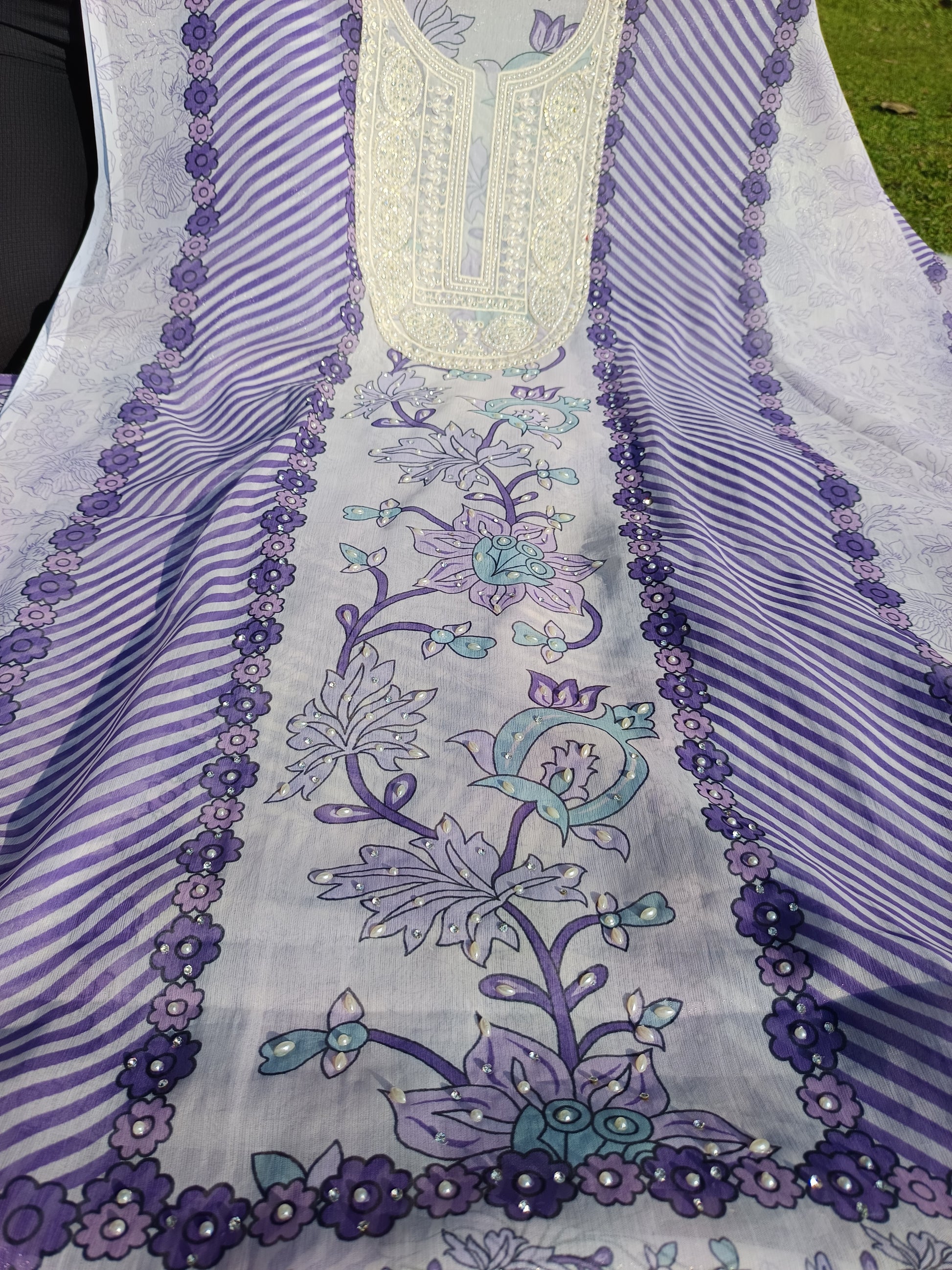 Model wearing georgette pearl suit styled for a chic festive look