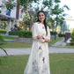 Elegant white kurta set crafted with fine detailing

