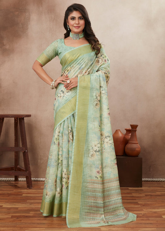 Woman wearing pastel green floral saree with blouse