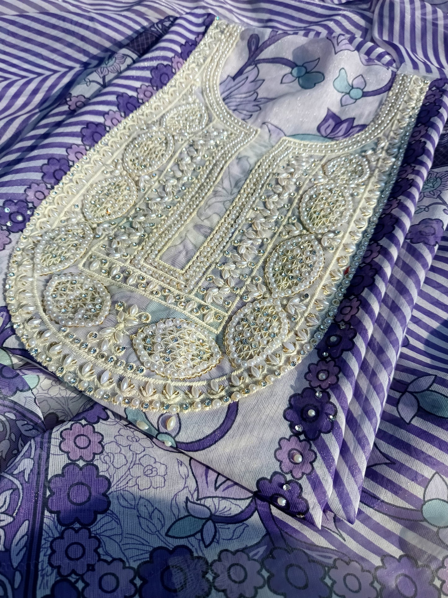 Lightweight dupatta showcasing delicate pearl handwork and fine texture