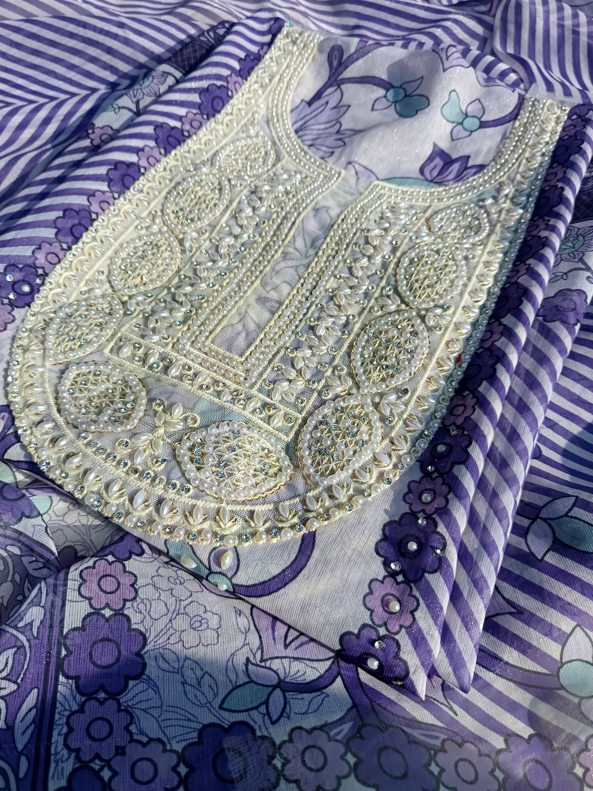 Lightweight dupatta showcasing delicate pearl handwork and fine texture