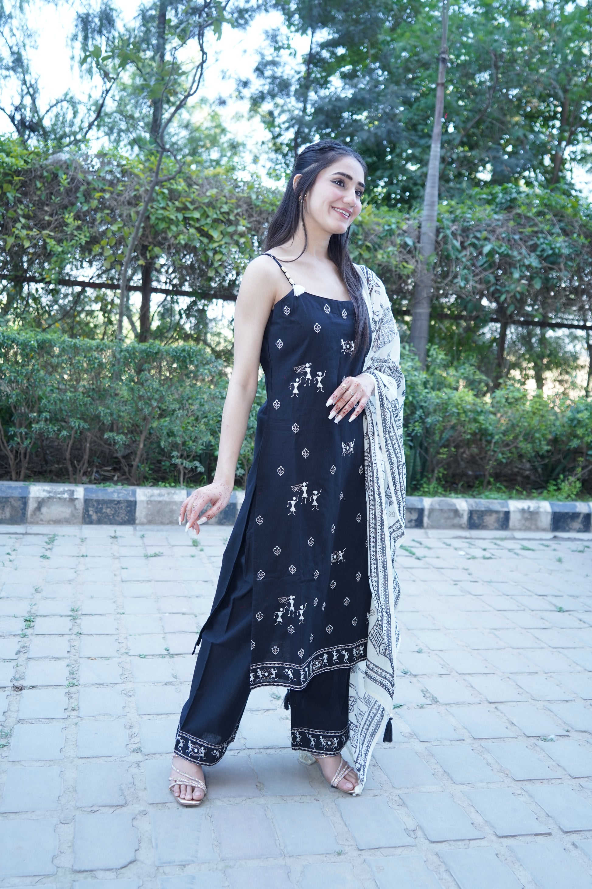 Festive black embroidered Shehnaaz straight suit for parties.