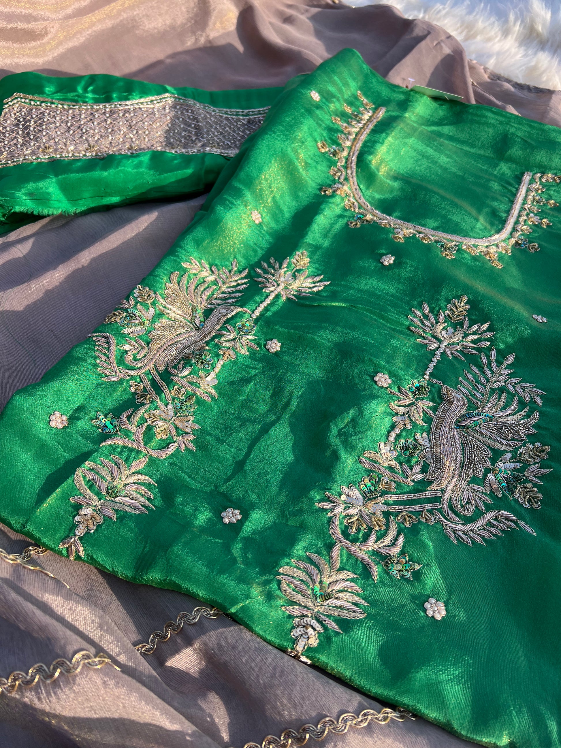 Glamorous organza suit with shimmering handwork for standout traditional style