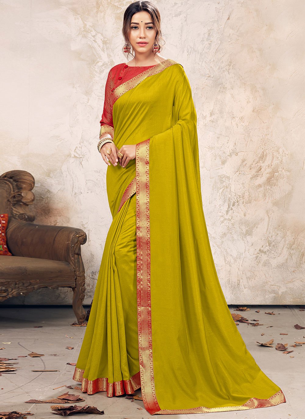 Elegant green Vichitra silk saree with intricate lace detailing