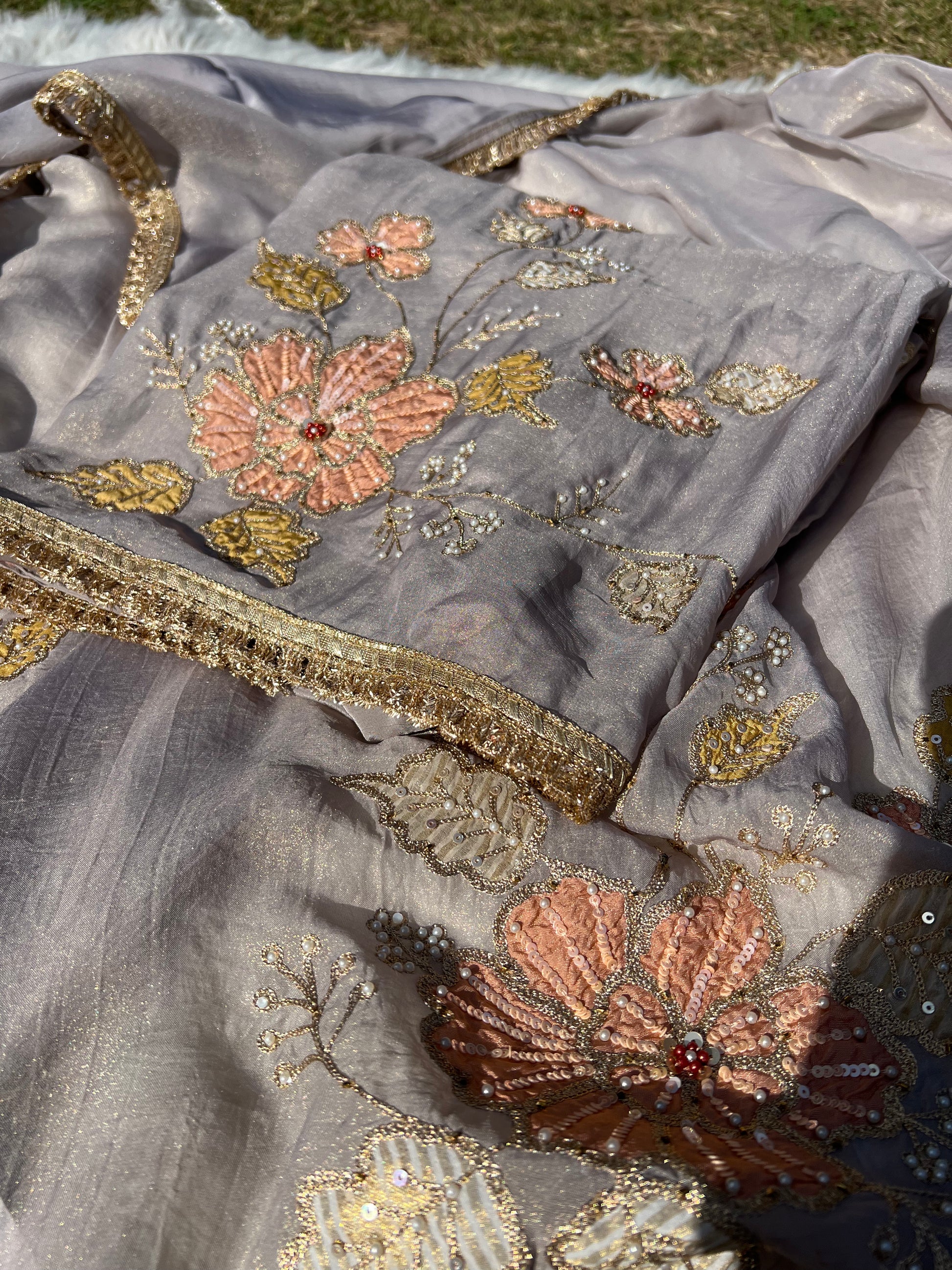 Detailed view of sleeve design with fine edges and intricate finishing
