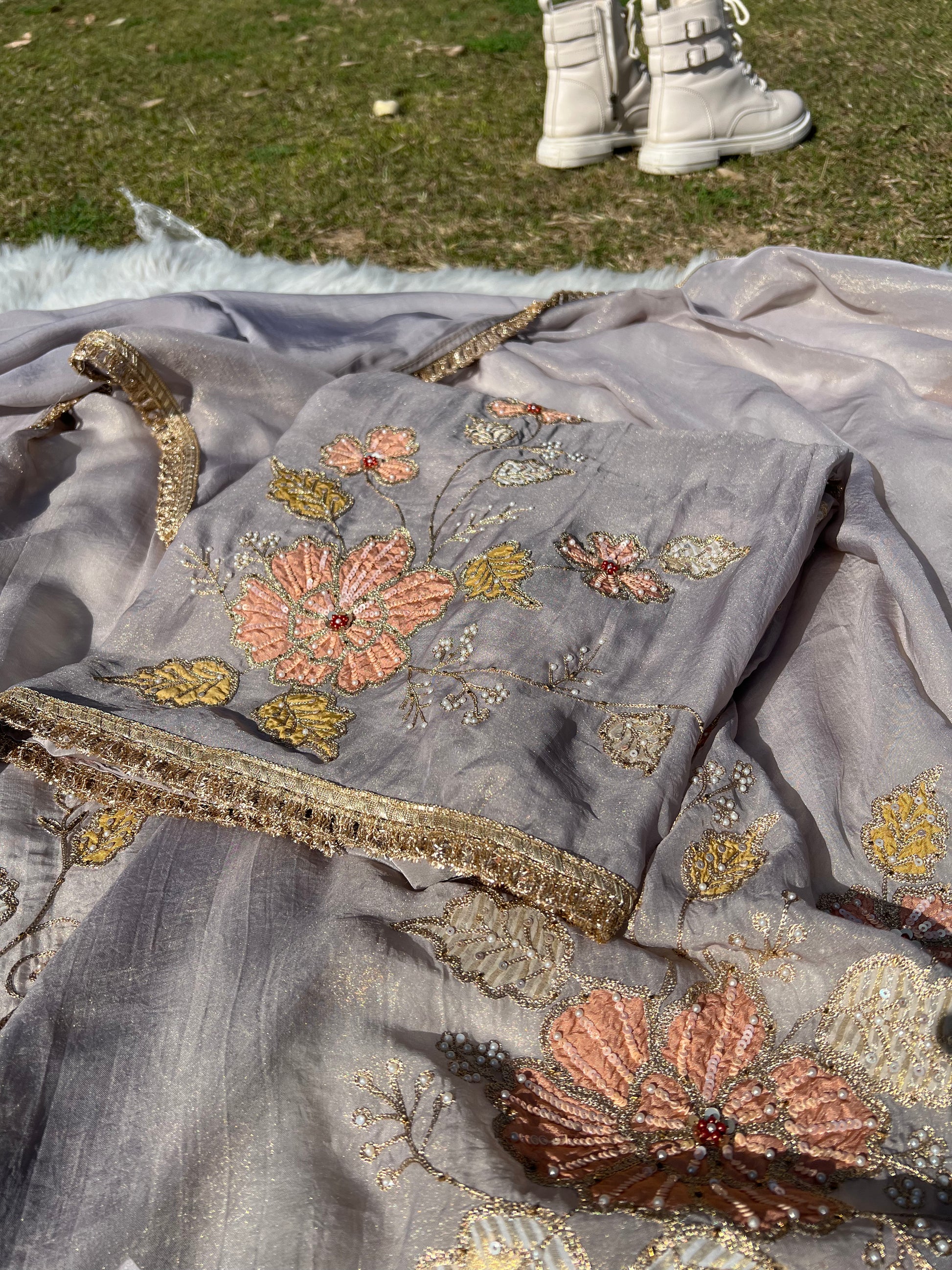 Close-up of grey silk dupatta with sheer organza fabric and subtle thread work