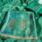 Close-up of intricate handwork on Bandhani organza suit
