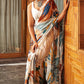 Elegant ivory chiffon saree set with delicate prints, perfect for a lightweight and graceful look at any occasion.