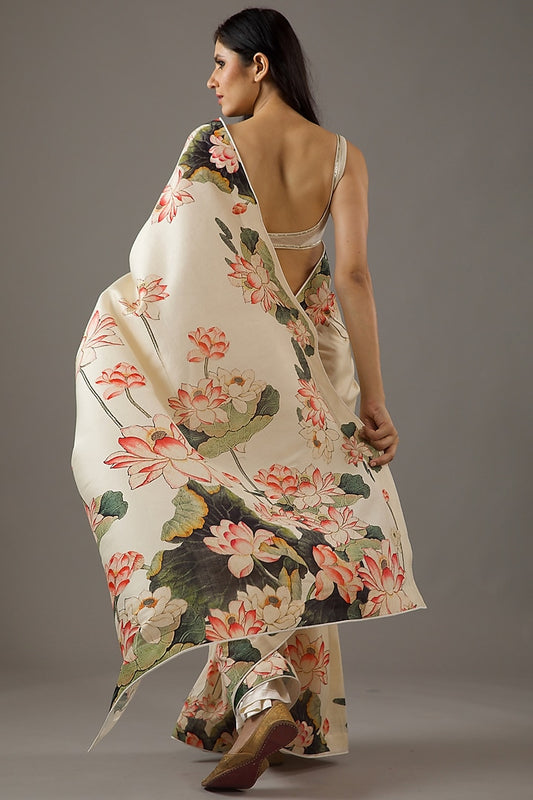 Beautiful printed Chanderi saree in ivory silk, ideal for festive gatherings and formal ethnic wear.