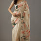 Graceful ivory silk Chanderi saree set with intricate prints, perfect for elegant occasions and traditional celebrations.