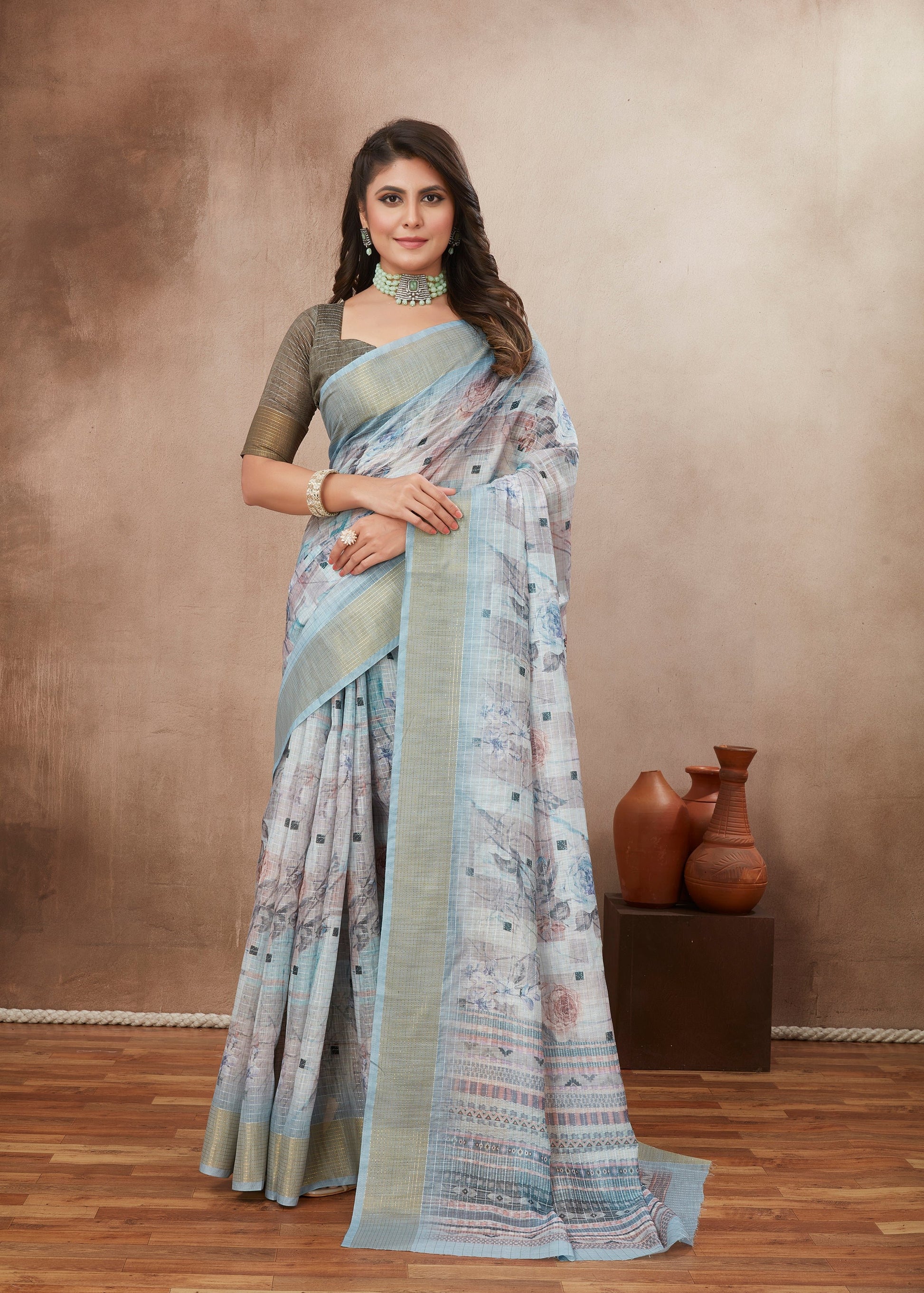 Elegant light blue cotton silk saree, perfect for a comfortable yet stylish traditional look.