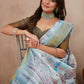 Beautiful light blue saree made from cotton silk, perfect for festive and formal gatherings.